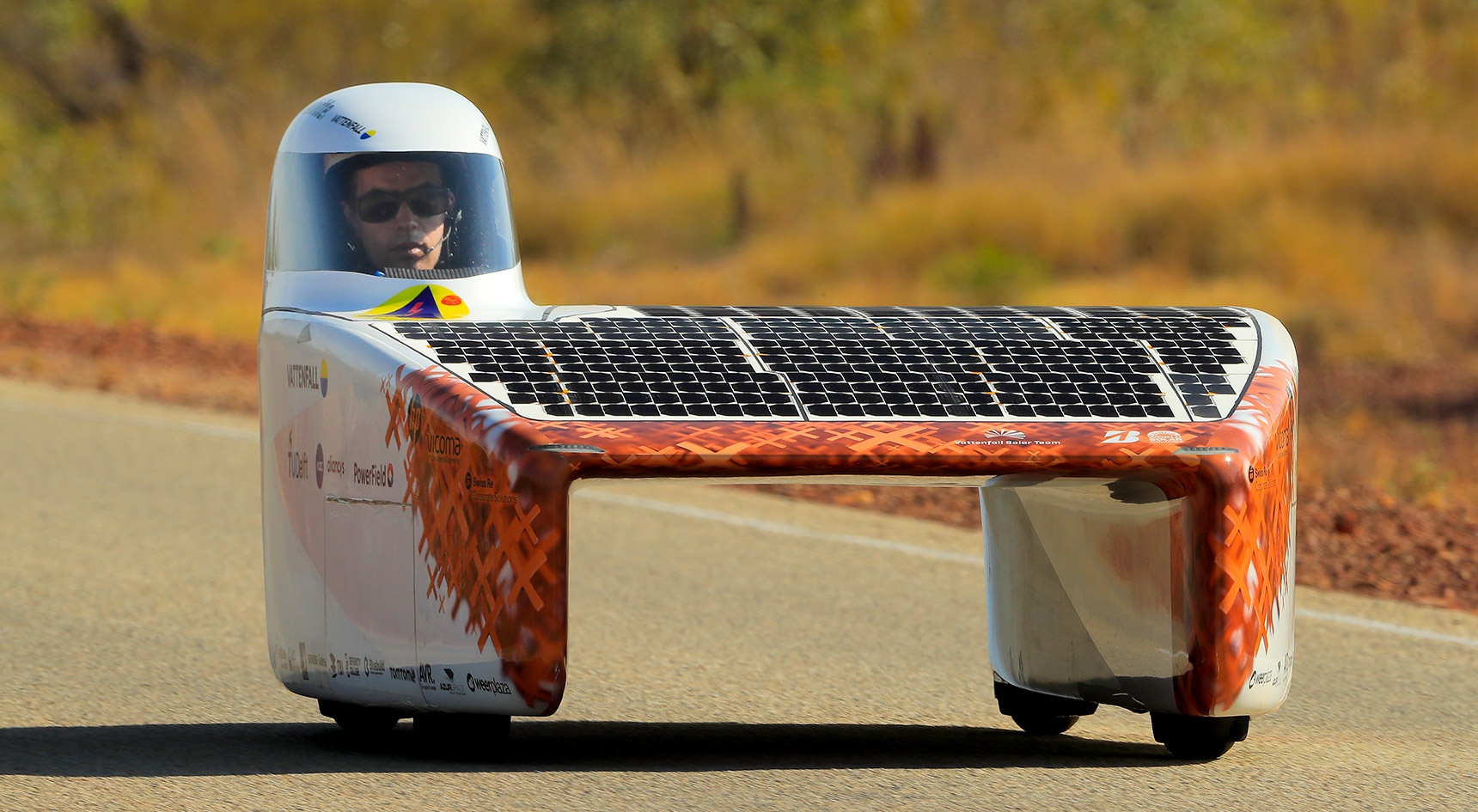 Futuristic looking car covered in solar panels.