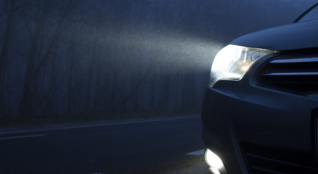 A right fog light switched on in wet weather.