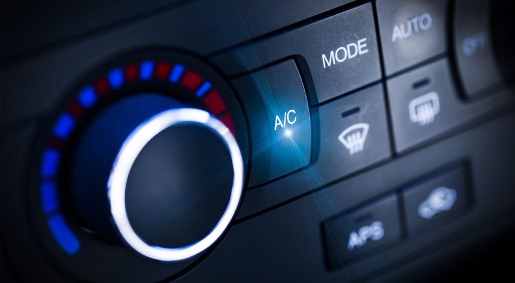 Air-conditioning dials in a car.