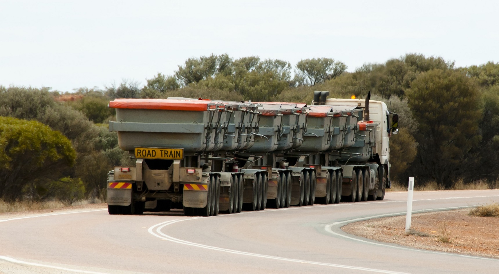 Large trucks, especially those displaying a ‘do not overtake turning vehicle’ sign, are often too big to navigate a multi-lane roundabout without crossing lanes.