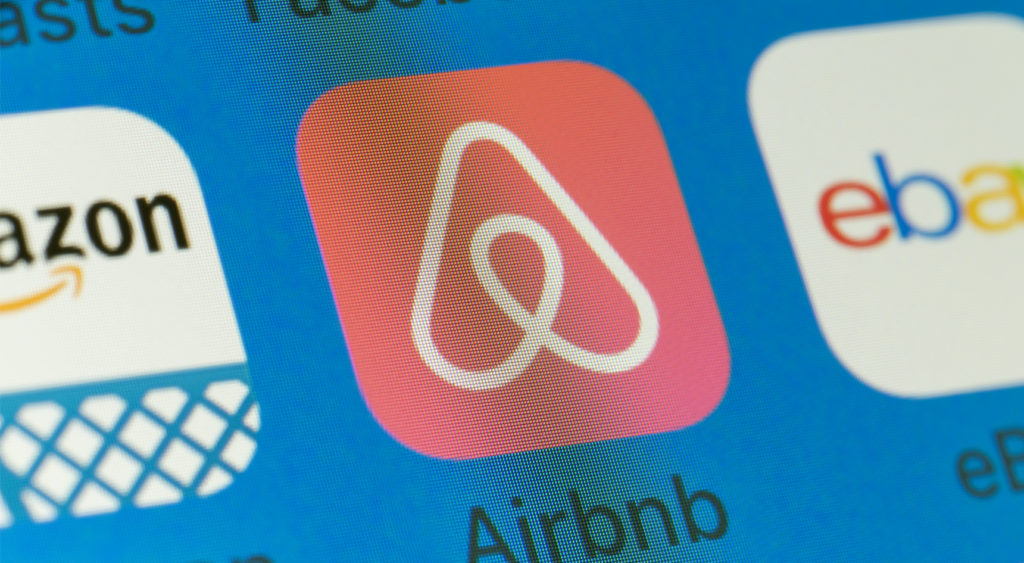 An image of the Airbnb icon on a phone screen.