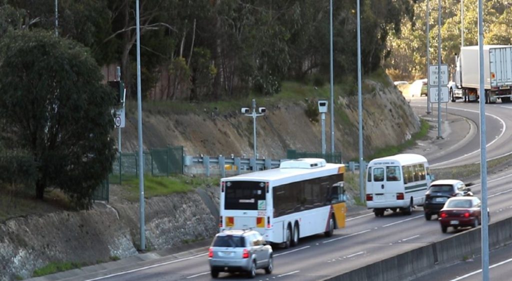 Buses and cars travelling down the South Eastern Freeway