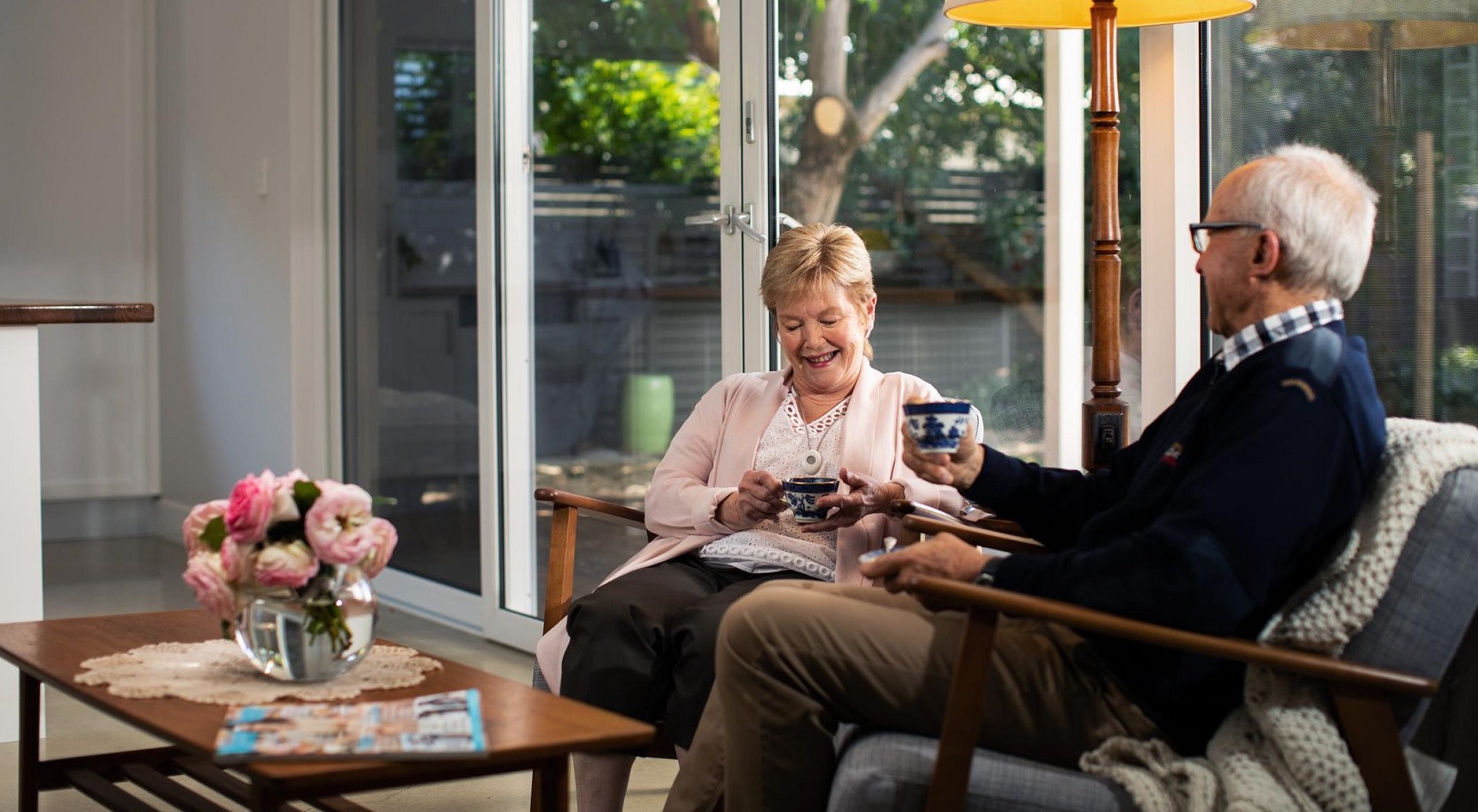 A couple talking over a cup of tea.