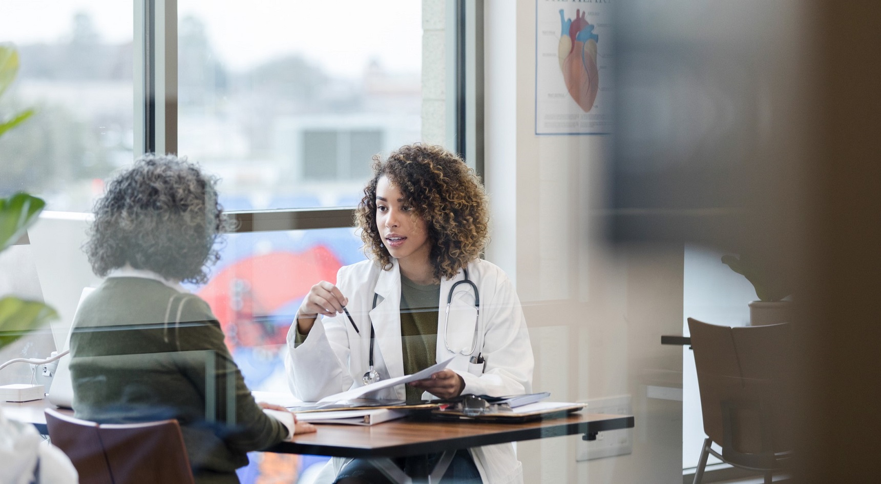 Doctor consulting a patient.