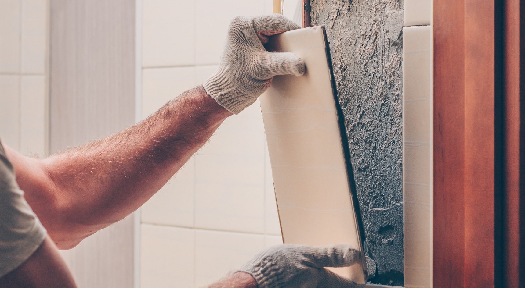 Asbestos can be found on the backing of tiles.