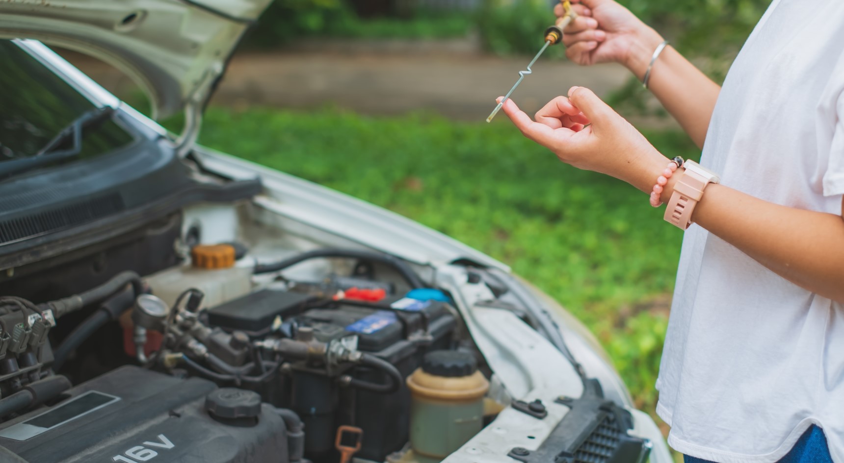 Checking the dipstick for your car's engine oil level is very important. Image: Getty