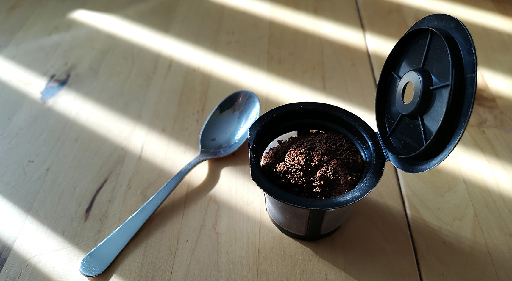 Reusable coffee pod filled with coffee.