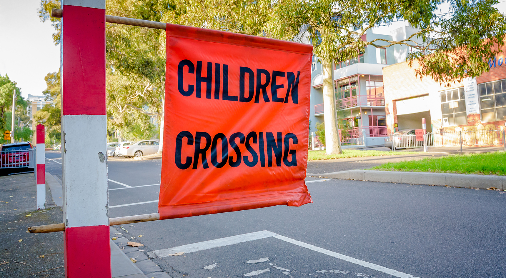 Orange children crossing sign