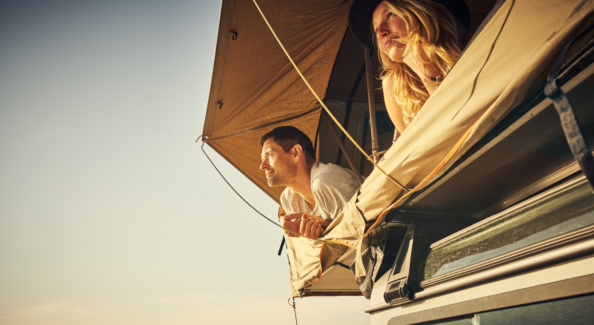 Campers in rooftop tent