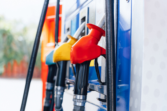 An image of a row of fuel pumps at a petrol station.