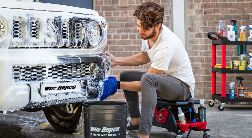 Man washing his car.