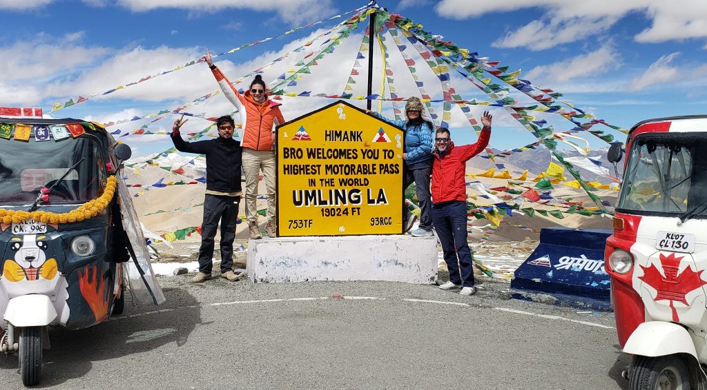 Auto rickshaws on the summit of Umling La Pass.