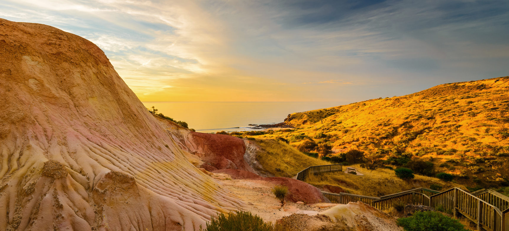 A view of the Hallett Cove Boardwalk with the ocean in the background.
