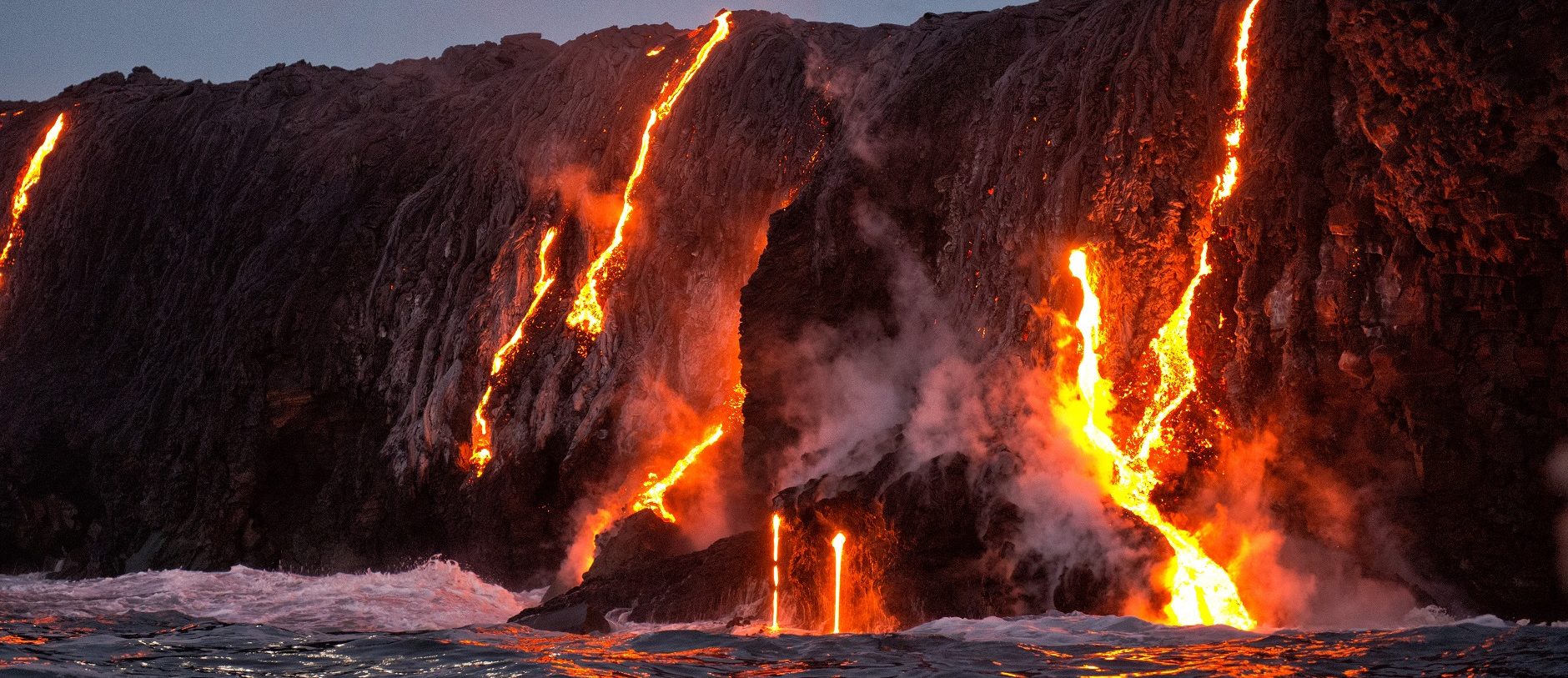Lava from Kilauea volcano entering ocean, Big Island in Hawaii.