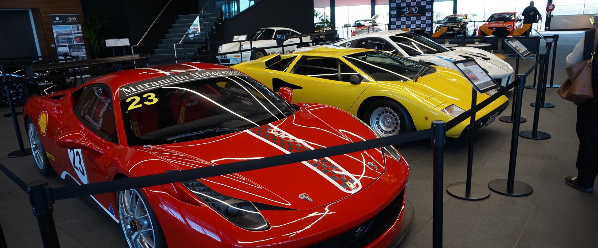 Upon entry, you'll be greeted by a stable of supercars.